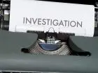 Co robić po kryminologii - investigation napis na kartce wystającej z maszyny do pisania