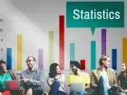 Kwartyl - ludzie na tle wykresu z napisem "statistics"