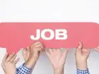 Praca Brzesko - ludzie trzymający napis job