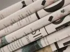 Praca Ruch - gazety złożone w rulony