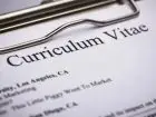 Klauzula CV - zbliżenie na napis curriculum vitae na dokumencie 1