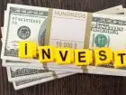 Inwestycja Google 5 mln - napis invest na dolarach