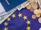 Taksonomia - flaga UE i pieniądze w walucie EURO