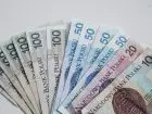 Bon turystyczny Podlasie - banknoty polskie na białym tle