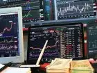 Trading - wykresy na ekranach komputerów