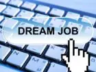 Wniosek o przedłużenie umowy o pracę - wzór - napis dream job na tle klawiatury