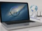 Takedrop czy Shy Shop - laptop z ikoną wózka sklepowego na ekranie