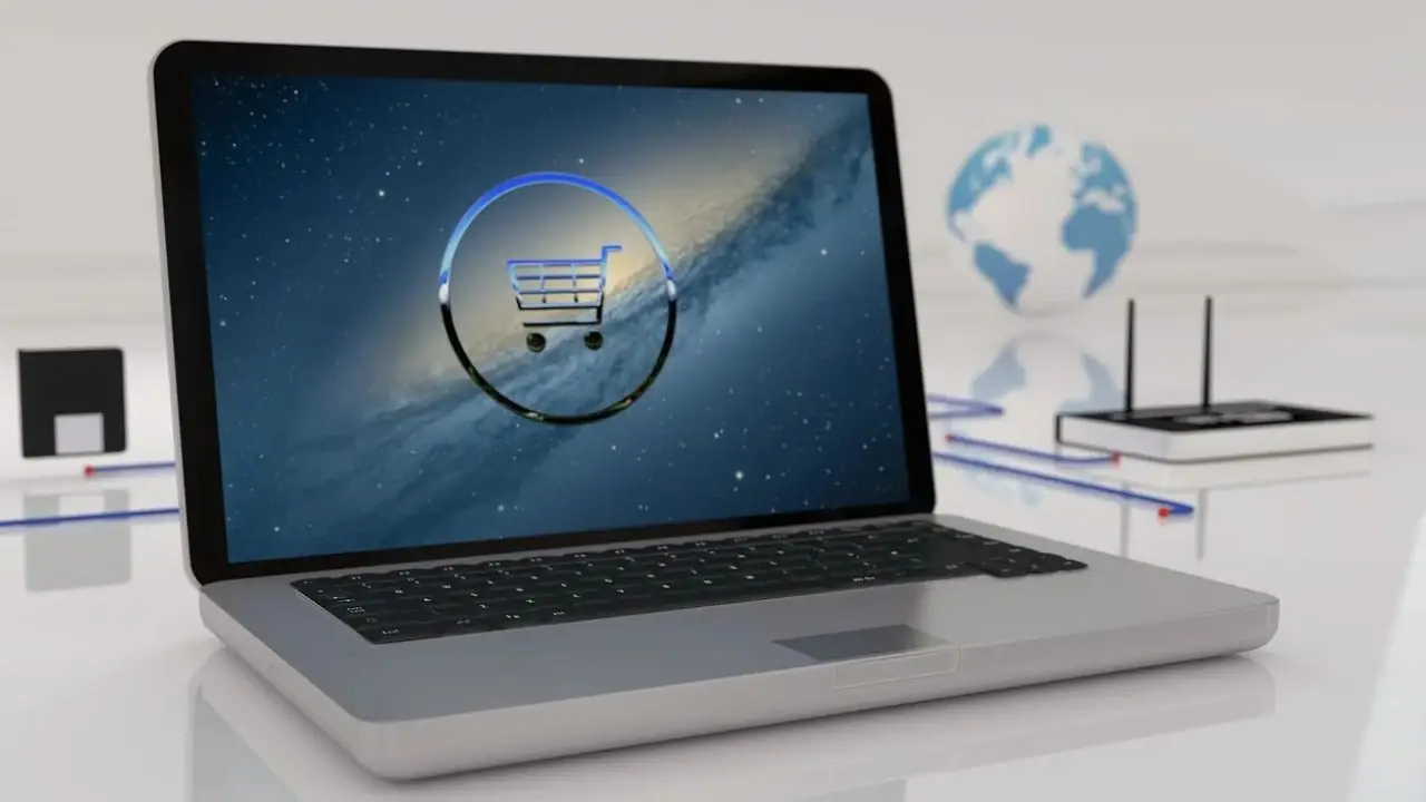 Takedrop czy Shy Shop - laptop z ikoną wózka sklepowego na ekranie